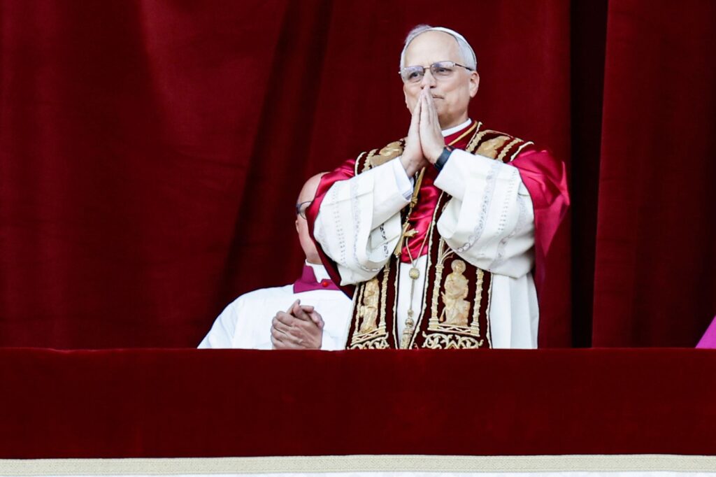 New Pope Leo XIV greets the crowds gathered at St.Peter's Basilica after his election as the new pope.